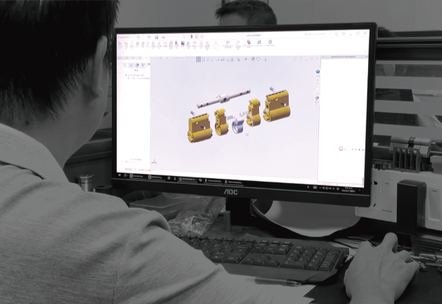 EOSYS R&D laboratory with engineers working on cylinder prototypes